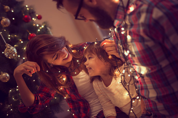 Young, Happy Family On Christmas